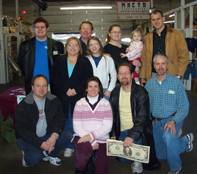 A unified assembly of believers gathered together at a local outreach event, ready to share their faith.